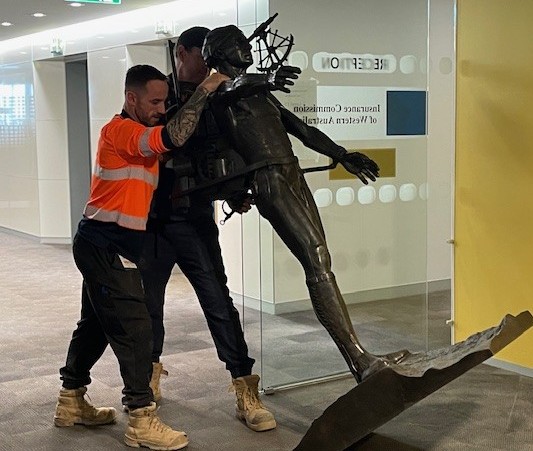 statue moved out of the office 