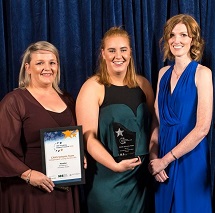 3 people standing holding the 2019 innovation award from the WA Disability Support Award.