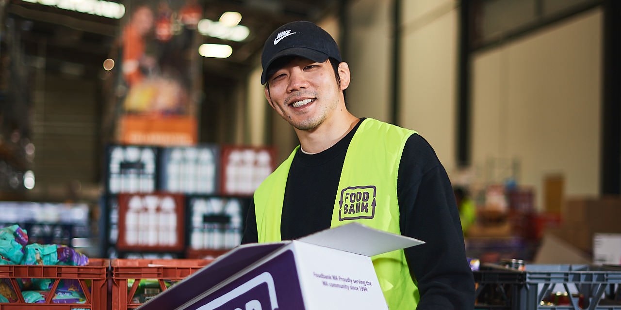 Staff volunteering at Foodbank WA