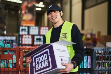 Staff volunteering at Foodbank WA